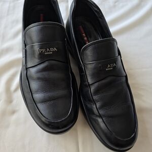 Prada Men's Elegant Black Leather Slip-Ons